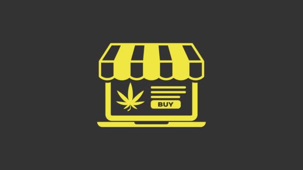 Gelber Laptop und medizinisches Marihuana oder Cannabisblatt auf grauem Hintergrund. Online-Kauf-Symbol. Supermarktkorb. 4K Video Motion Grafik Animation — Stockvideo