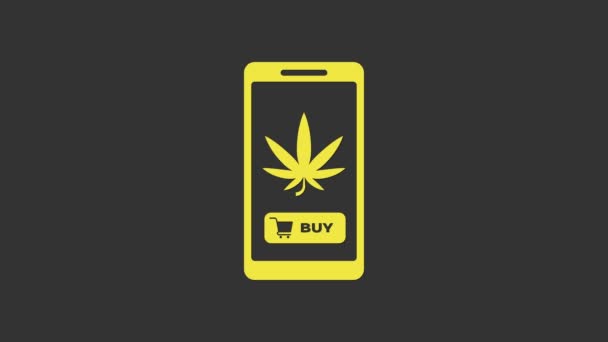 Telefone celular amarelo e maconha medicinal ou ícone de folha de cannabis isolado em fundo cinza. Símbolo de compra online. Cesta de supermercado. Animação gráfica em movimento de vídeo 4K — Vídeo de Stock