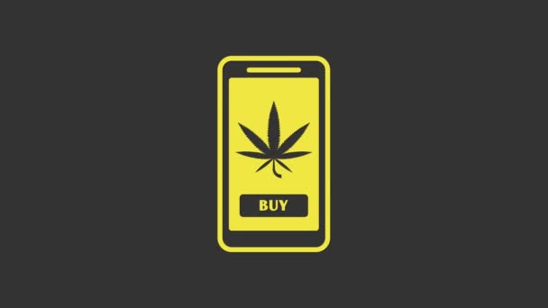 Cellulare giallo e marijuana medica o icona foglia di cannabis isolato su sfondo grigio. Simbolo di acquisto online. Cesto del supermercato. Animazione grafica 4K Video motion — Video Stock