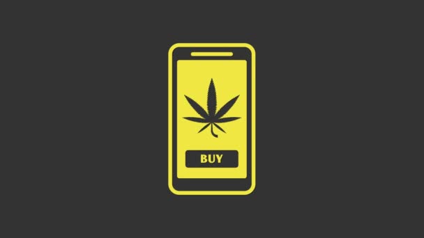 Žlutý Mobilní telefon a lékařská marihuana nebo konopný list ikony izolované na šedém pozadí. Online nákupní symbol. Koš v supermarketu. Grafická animace pohybu videa 4K