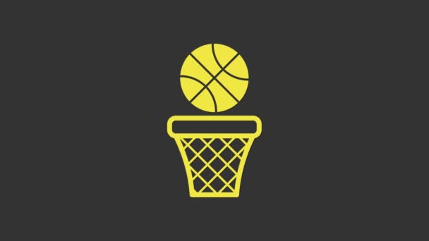 Yellow Basketball ball and basket icon isolated on grey background. Ball in basketball hoop. 4K Video motion graphic animation — Stock Video