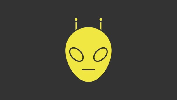 Icône Alien jaune isolée sur fond gris. Visage extraterrestre extraterrestre ou symbole de tête. Animation graphique de mouvement vidéo 4K — Video