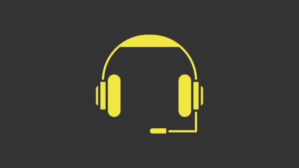 Žluté sluchátka ikona izolované na šedém pozadí. Sluchátka. Koncepce poslechu hudby, služeb, komunikace a operátora. Grafická animace pohybu videa 4K — Stock video