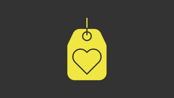 Ícone amarelo da etiqueta do coração isolado no fundo cinza. Símbolo de amor. Símbolo do dia dos namorados. Animação gráfica em movimento de vídeo 4K — Vídeo de Stock