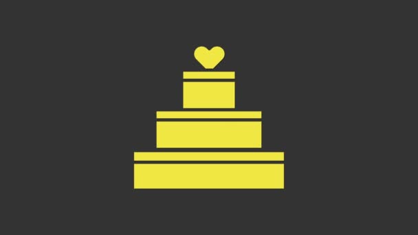Bolo de casamento amarelo com ícone do coração isolado no fundo cinza. Símbolo do dia dos namorados. Animação gráfica em movimento de vídeo 4K — Vídeo de Stock