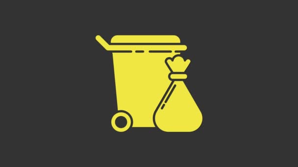 Papelera amarilla y bolsa de basura icono aislado sobre fondo gris. Cartel de basura. Reciclar icono de cesta. Icono de basura de oficina. Animación gráfica de vídeo 4K — Vídeos de Stock