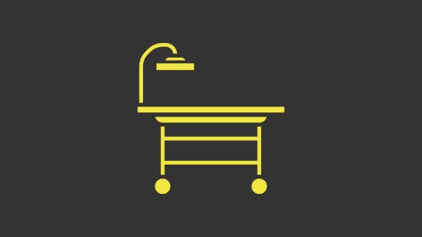 Yellow Operating table icon isolated on grey background. 4K Video motion graphic animation — Stock Video