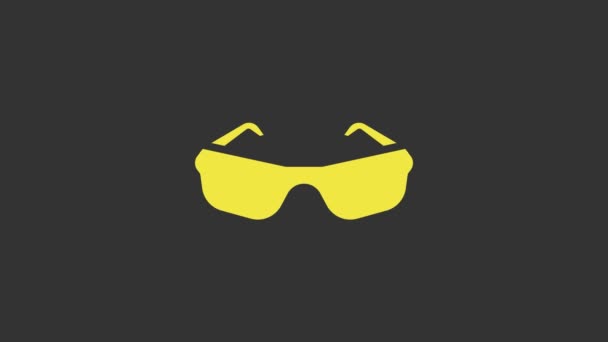 Желтые очки значок изолирован на сером фоне. Символ рамы для очков. Видеографическая анимация 4K — стоковое видео