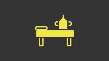 Gri arkaplanda yağ simgesi olan sarı masaj masası. 4K Video hareketli grafik canlandırması