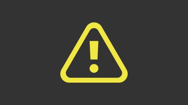 Yellow Exclamation mark in triangle icon isolated on grey background. Hazard warning sign, careful, attention, danger warning sign. 4K Video motion graphic animation — Stock Video