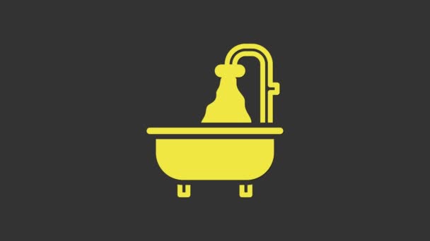Желтая иконка ванны выделена на сером фоне. Видеографическая анимация 4K — стоковое видео