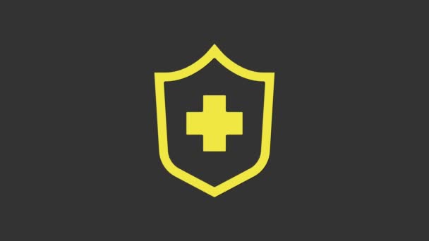 Желтый значок медицинского страхования на сером фоне. Защита пациентов. Безопасность, безопасность, защита, концепция защиты. Видеографическая анимация 4K — стоковое видео