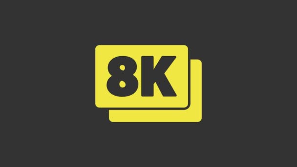 Icono amarillo de 8k Ultra HD aislado sobre fondo gris. Animación gráfica de vídeo 4K — Vídeo de stock