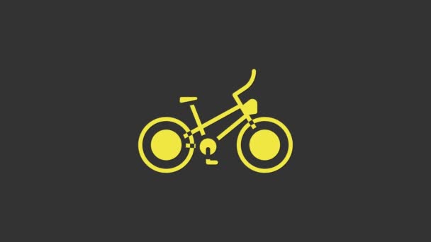 Κίτρινη εικόνα ποδηλάτων απομονωμένη σε γκρι φόντο. Αγώνας ποδηλάτων. Ακραίο άθλημα. Αθλητικός εξοπλισμός. 4K Γραφική κίνηση κίνησης βίντεο — Αρχείο Βίντεο