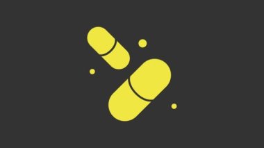 Gri arka planda izole edilmiş hap kapsülü ikonunun sarı vitamin kompleksi. Sağlıklı bir yaşam tarzı. 4K Video hareketli grafik canlandırması
