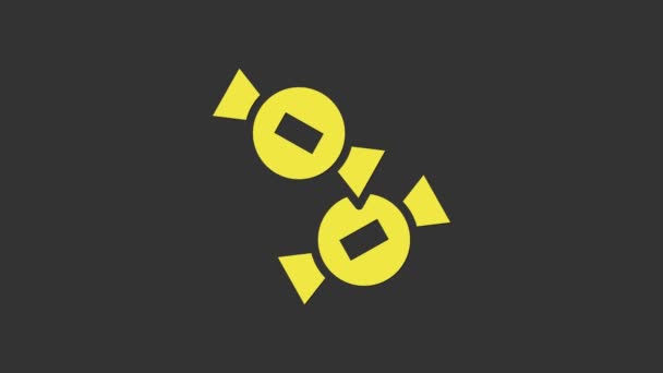 Icono de caramelo amarillo aislado sobre fondo gris. Animación gráfica de vídeo 4K — Vídeo de stock