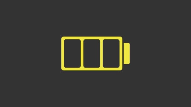 Icono indicador de nivel de carga de la batería amarilla aislado sobre fondo gris. Animación gráfica de vídeo 4K — Vídeos de Stock