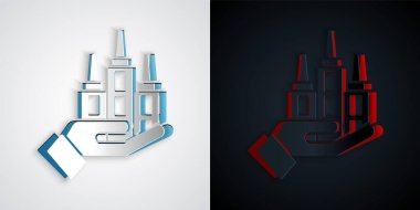 Kağıt kesiği gökdelen simgesi gri ve siyah arkaplanda izole edilmiş. Metropolis mimarisi panoramik manzara. Kağıt sanatı tarzı. Vektör
