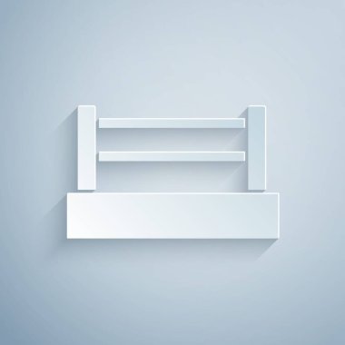 Kağıt kesiği boks yüzüğü simgesi gri arkaplanda izole edildi. Kağıt sanatı tarzı. Vektör