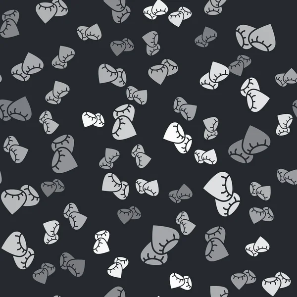 Belirli bir bitki simgesinin gri tohumları siyah arkaplanda izole edilmiş. Vektör