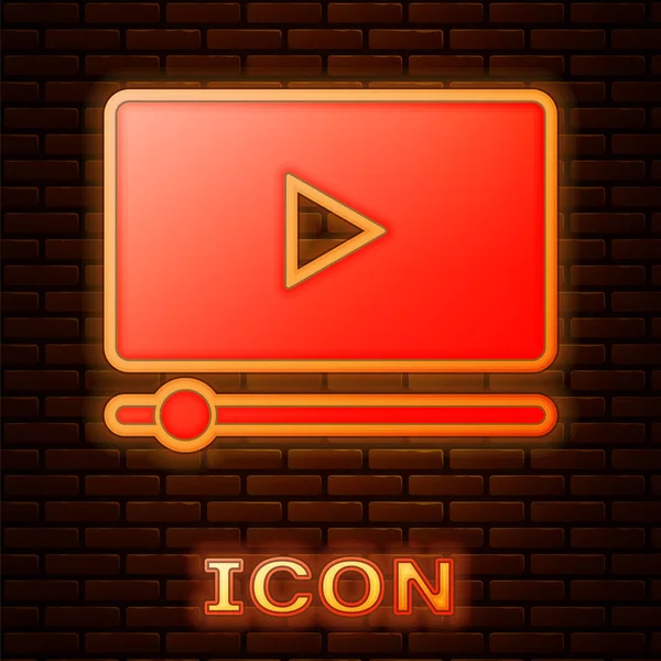 Brillante neón Online reproducir icono de vídeo aislado en el fondo de la pared de ladrillo. Película de tira con señal de juego. Vector — Vector de stock