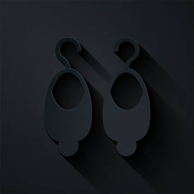 Kağıt kesiği Küpe simgesi siyah arkaplanda izole edilmiş. Mücevher aksesuarları. Kağıt sanatı tarzı. Vektör.