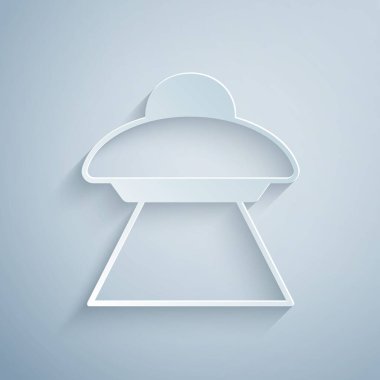 Kağıt kesiği UFO uçan uzay gemisi simgesi gri arka planda izole edildi. Uçan daire. Uzaylı uzay gemisi. Gelecekteki bilinmeyen uçan nesne. Kağıt sanatı tarzı. Vektör