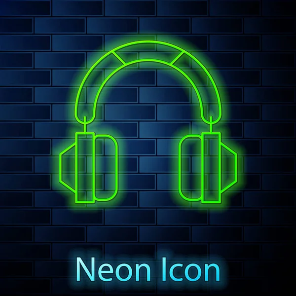 Icono Auriculares Línea Neón Brillante Aislado Fondo Pared Ladrillo Auriculares — Vector de stock