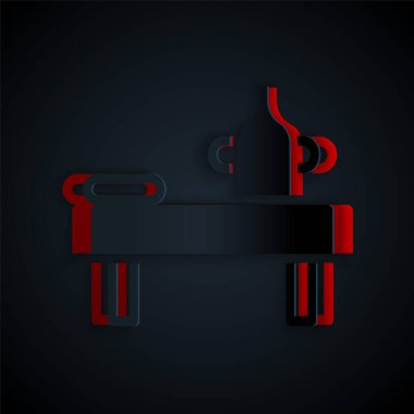 Kağıt kesiği, siyah zemin üzerinde yağ simgesi olan masaj masası. Kağıt sanatı tarzı. Vektör.