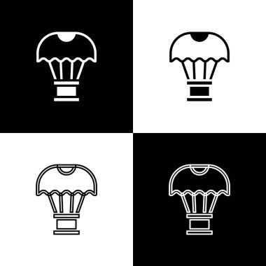 Siyah ve beyaz arka planda izole edilmiş paraşüt simgesi üzerinde uçan kutuyu ayarla. Nakliye için paraşütlü paket. Teslimat servisi, hava taşımacılığı. Vektör