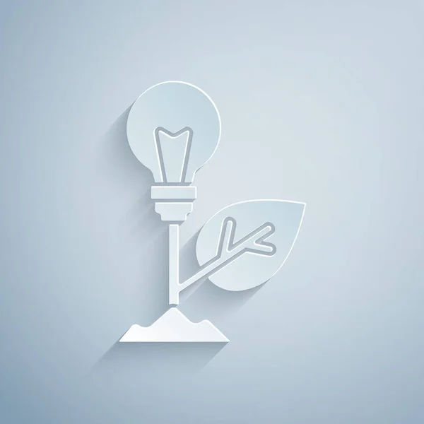 Papiergeschnittene Glühbirne Mit Blattsymbol Auf Grauem Hintergrund Ökoenergiekonzept Alternatives Energiekonzept — Stockvektor