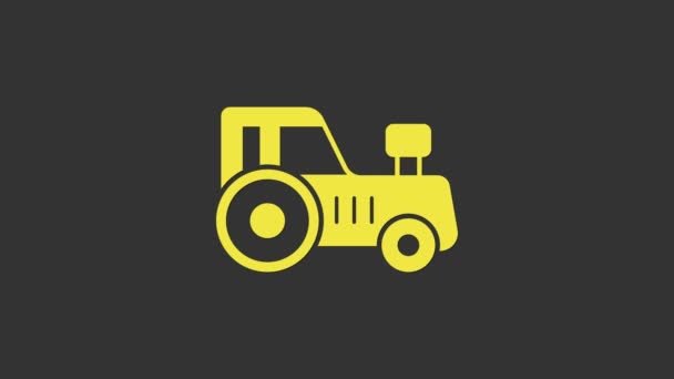 Icono del tractor amarillo aislado sobre fondo gris. Animación gráfica de vídeo 4K — Vídeos de Stock