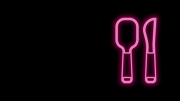 Glowing neon line Knife and spoon icon isolated on black background. Cooking utensil. Cutlery sign. 4K Video motion graphic animation — Stock Video