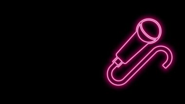Parlayan neon hattı mikrofon simgesi siyah arkaplanda izole edildi. Radyodaki mikrofondan. Sözcü işareti. 4K Video hareketli grafik canlandırması