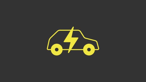 Yellow Electric car and electrical cable plug charging icon isolated on grey background. Renewable eco technologies. 4K Video motion graphic animation — Stock Video