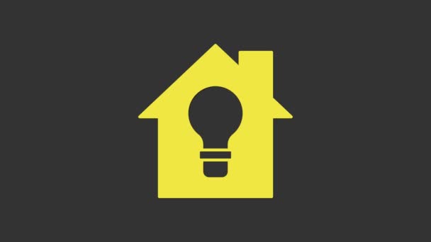 Yellow Smart house and light bulb icon isolated on grey background. 4K Video motion graphic animation — Stock Video