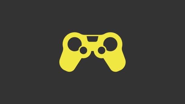 Ícone Amarelo Gamepad isolado no fundo cinza. Controlador de jogo. Animação gráfica em movimento de vídeo 4K — Vídeo de Stock