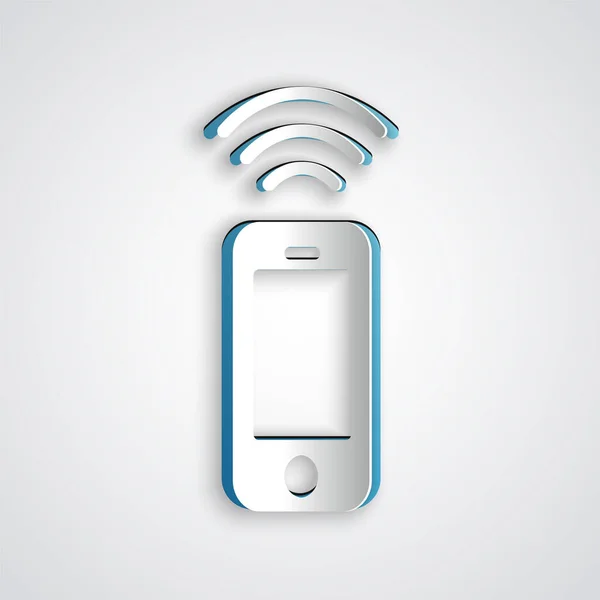 Papier gesneden Draadloos smartphone icoon geïsoleerd op grijze achtergrond. Papierkunst stijl. Vector — Stockvector