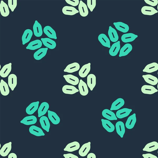 Gröna och beige frön av en specifik växt ikon isolerade sömlösa mönster på blå bakgrund. Vektor — Stock vektor