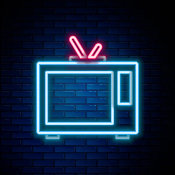 Brillante línea de neón Retro tv icono aislado en el fondo de la pared de ladrillo. Señal de televisión. Concepto de esquema colorido. Vector — Vector de stock