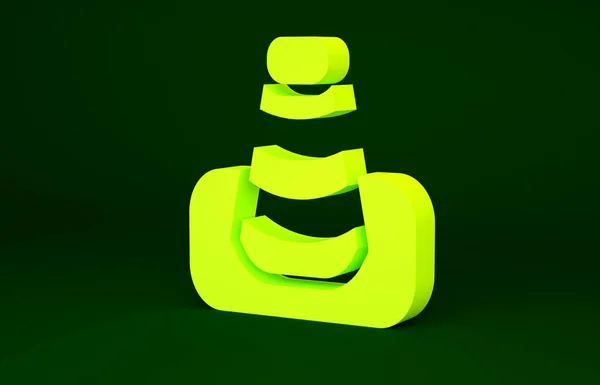 Жовта піктограма конуса руху ізольована на зеленому тлі. Концепція мінімалізму. 3D ілюстрація 3D рендеринга — стокове фото