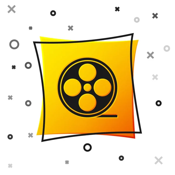Ikone der schwarzen Filmspule isoliert auf weißem Hintergrund. Gelber quadratischer Knopf. Vektor — Stockvektor