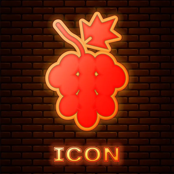 Icono de fruta de uva de neón brillante aislado en el fondo de la pared de ladrillo. Vector — Vector de stock