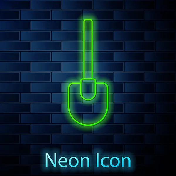 Glödande neon linje skyffla ikonen isolerad på tegel vägg bakgrund. Trädgårdsredskap. Verktyg för trädgårdsodling, jordbruk, jordbruk. Vektor — Stock vektor
