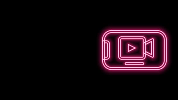 Gloeiende neon lijn Online play video icoon geïsoleerd op zwarte achtergrond. Smartphone en filmstrip met speelbord. 4K Video motion grafische animatie — Stockvideo