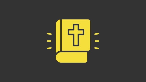Желтая икона Священной Библии изолирована на сером фоне. Видеографическая анимация 4K — стоковое видео