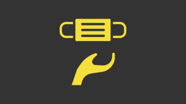 Sarı Tıbbi Koruyucu Maske simgesi gri arka planda izole edildi. 4K Video hareketli grafik canlandırması