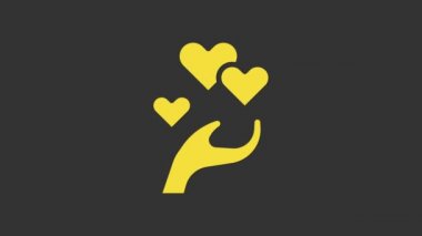 Sarı Kalp 'in el simgesi gri arkaplanda izole edildi. El çabukluğu aşk sembolü. Sevgililer Günü sembolü. 4K Video hareketli grafik canlandırması