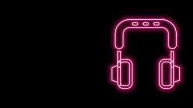 Parlayan neon hattı kulaklık simgesi siyah arkaplanda izole edildi. Kulaklıklar. Müzik, hizmet, iletişim ve operatör konsepti. 4K Video hareketli grafik canlandırması
