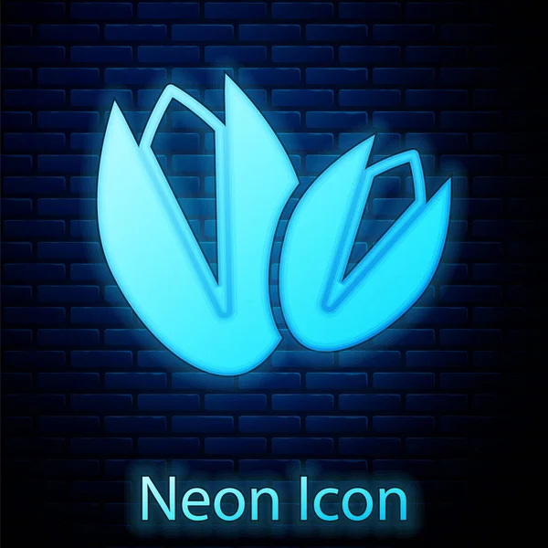 Glowing neon Pistachio nuts icon isolated on brick wall background. Vector — 스톡 벡터